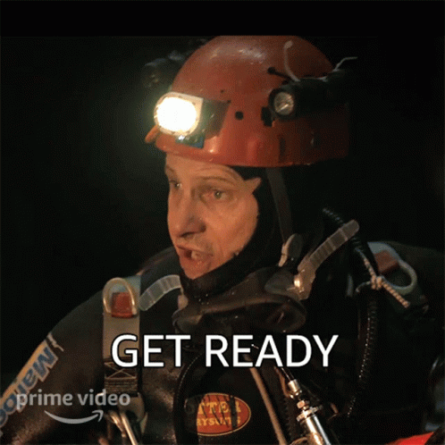 A Man Wearing A Helmet And A Mask Says Get Ready On The Bottom GIF