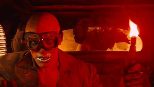 A Man Wearing A Helmet And Goggles Says " I Live I Die " GIF