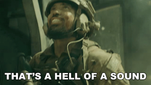 A Man Wearing A Helmet And Headphones With The Words That 'S A Hell Of A Sound Below Him GIF
