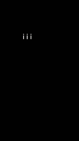 A Man Wearing A Helmet Stands In Front Of A Smokey Mountain GIF