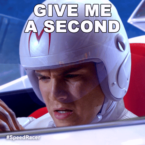 A Man Wearing A Helmet That Says Give Me A Second On It GIF