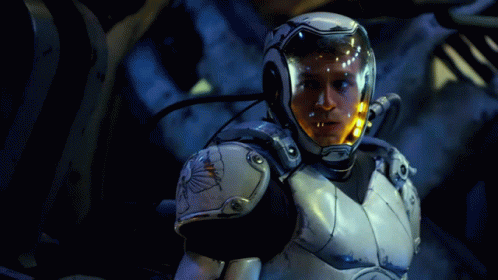 A Man Wearing A Helmet With The Number 222 On It GIF