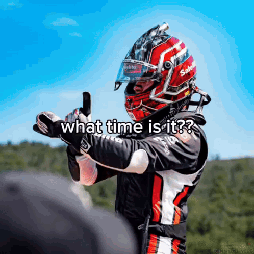 A Man Wearing A Helmet With The Words What Time Is It Written On It GIF