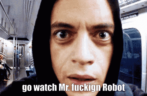 A Man Wearing A Hooded Jacket Says " Go Watch Mr. Fuckign Robot " GIF