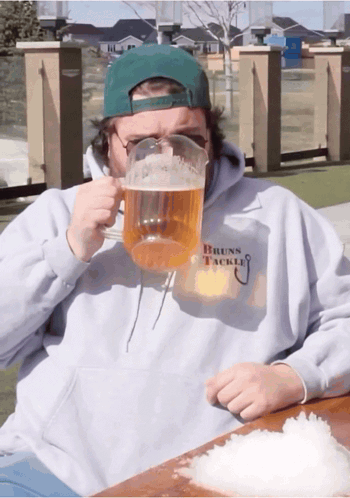 A Man Wearing A Hoodie That Says Bounce Tackle On It GIF
