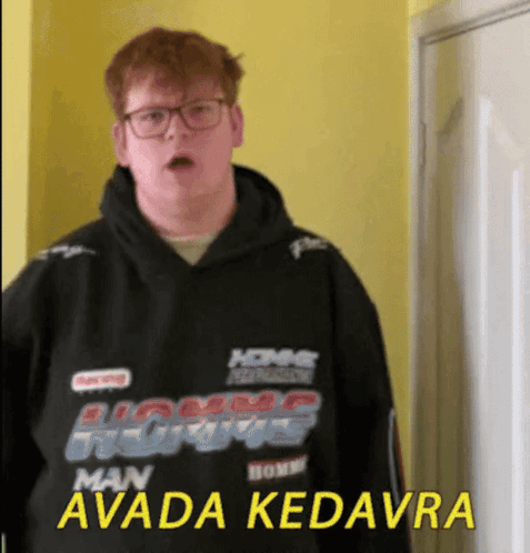 A Man Wearing A Hoodie That Says Man Avada Kedavra On It GIF