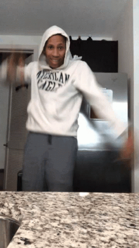 A Man Wearing A Hoodie That Says Mexican Mex Is Dancing GIF