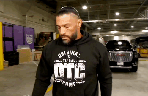 A Man Wearing A Hoodie That Says Otc Chief On It GIF