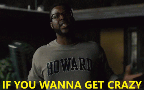 A Man Wearing A Howland Shirt Is Holding A Piece Of Paper GIF