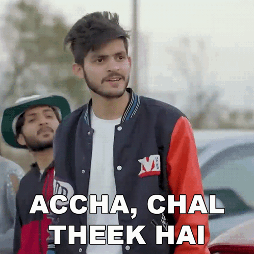 A Man Wearing A Jacket That Says Accha Chal Theek Hai GIF