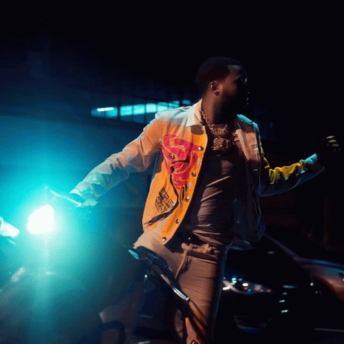 A Man Wearing A Jacket That Says ' I Love You ' On The Front GIF