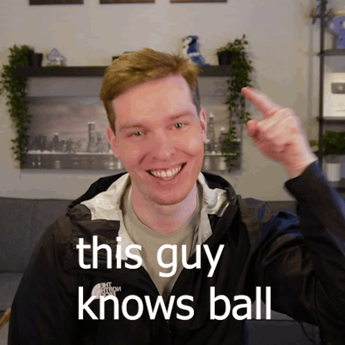 A Man Wearing A Jacket That Says The North Face Is Smiling And Giving A Thumbs Up GIF