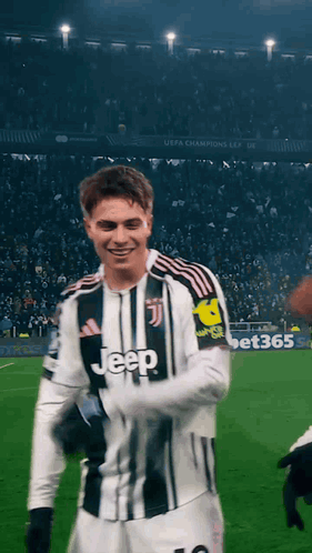 A Man Wearing A Jeep Jersey Stands On A Field GIF