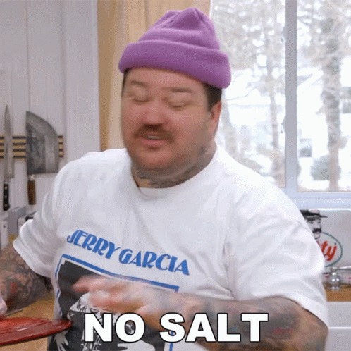 A Man Wearing A Jerry Garcia Shirt Says " No Salt " GIF