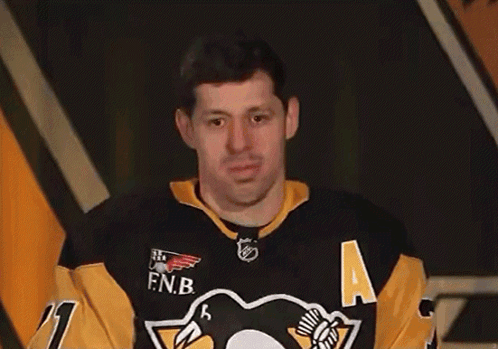 A Man Wearing A Jersey That Says Fnb On The Front GIF