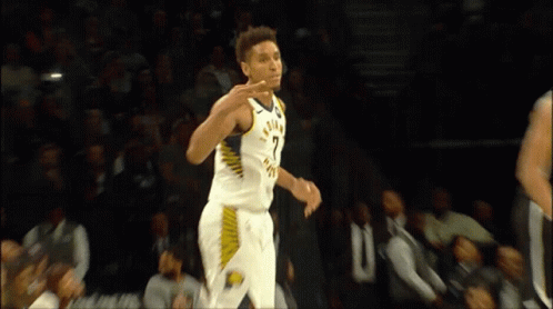 A Man Wearing A Jersey That Says Indiana On It GIF