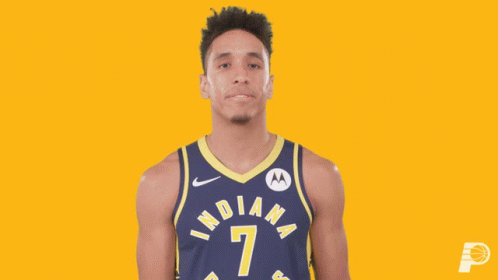 A Man Wearing A Jersey That Says Indiana On It GIF