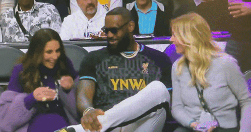 A Man Wearing A Jersey That Says Ynwa Sits In The Stands GIF