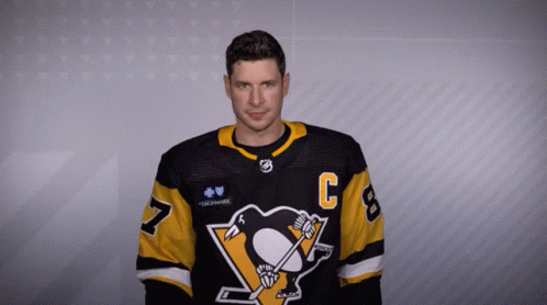 A Man Wearing A Jersey With The Letter C On It GIF
