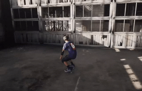 A Man Wearing A Jersey With The Number 16 On It Is Riding A Skateboard GIF