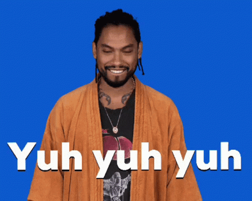 A Man Wearing A Kimono And A Black Shirt Says Yuh Yuh Yuh On A Blue Background GIF