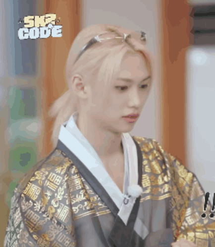 A Man Wearing A Kimono And Sunglasses With The Word Ska Code On The Bottom Right GIF