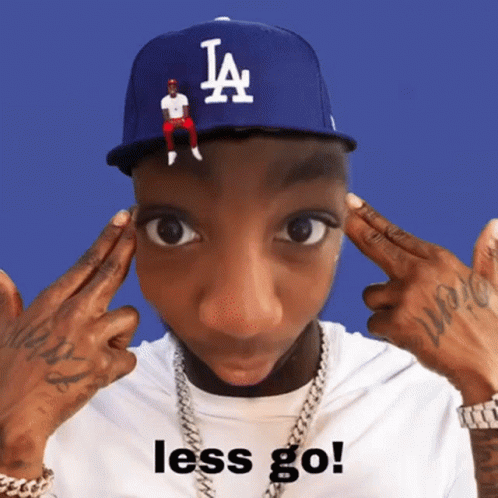 A Man Wearing A La Hat Is Making A Funny Face And Says Less Go GIF