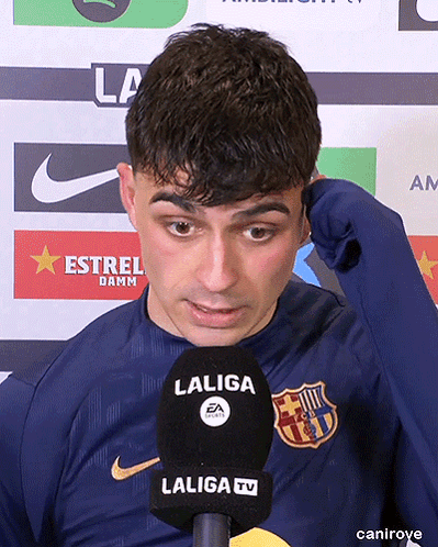 A Man Wearing A Laliga Shirt Talks Into A Laliga Microphone GIF