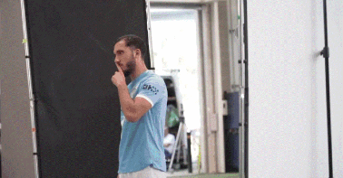 A Man Wearing A Light Blue Shirt With The Word Oni On The Sleeve GIF