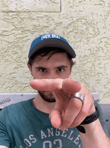 A Man Wearing A Los Angeles Shirt And A New Era Hat GIF
