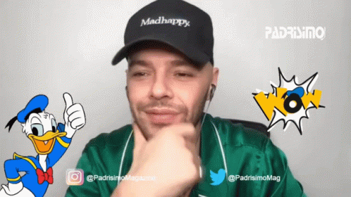 A Man Wearing A Madhappy Hat With Donald Duck In The Background GIF