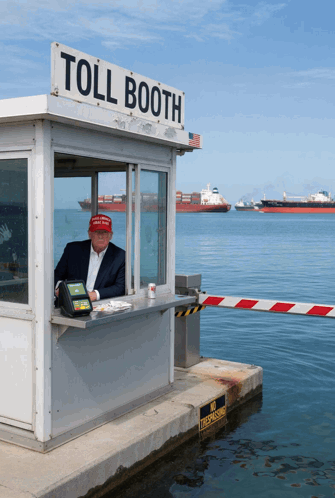 A Man Wearing A Maga Hat Stands In A Toll Booth GIF