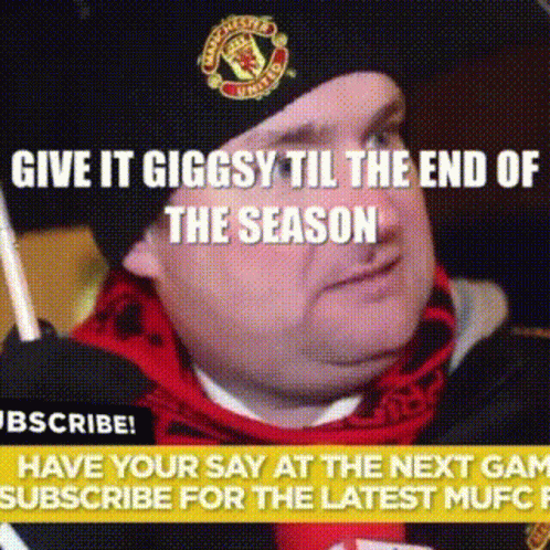 A Man Wearing A Manchester United Hat Is Holding A Stick GIF