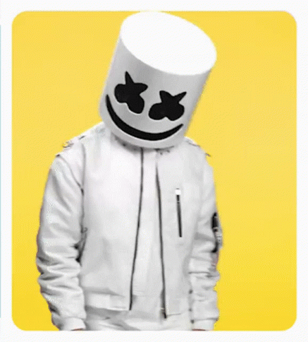 A Man Wearing A Marshmallow Mask And A White Jacket Is Dancing GIF