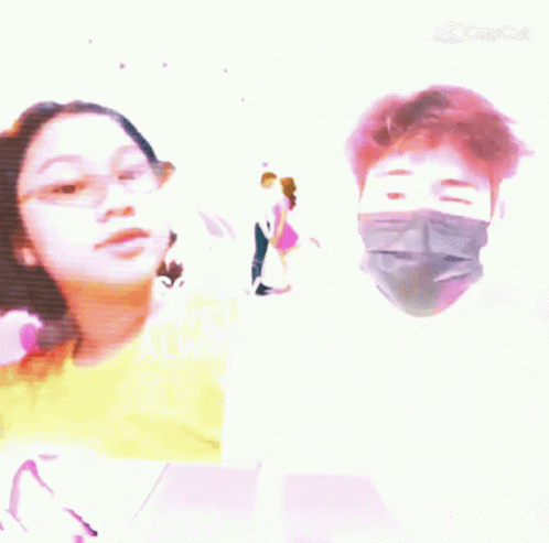 A Man Wearing A Mask And A Girl Wearing Glasses Are Standing Next To Each Other . GIF