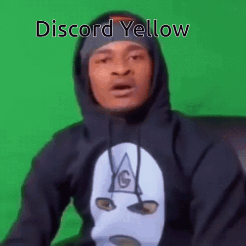 A Man Wearing A Mask And A Hoodie With The Words `` Discord Yellow '' On It . GIF