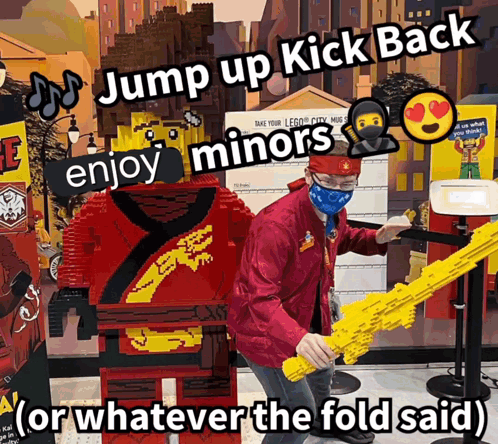 A Man Wearing A Mask Holds A Yellow Sword In Front Of A Lego Ninjago Figure GIF