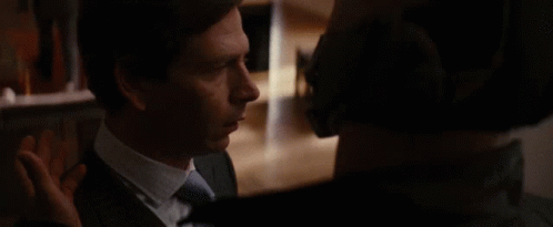 A Man Wearing A Mask Is Asking Another Man If He Feels In Charge GIF