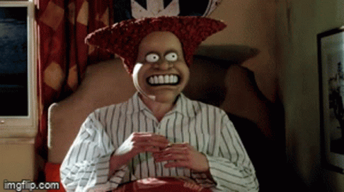 A Man Wearing A Mask Is Sitting On A Bed With Imgflip.com At The Bottom Of The Image GIF