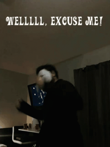 A Man Wearing A Mask Is Standing In Front Of A Sign That Says Welllll Excuse Me ! GIF