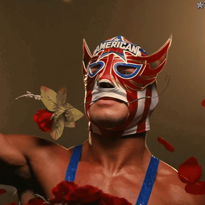 A Man Wearing A Mask That Says American GIF