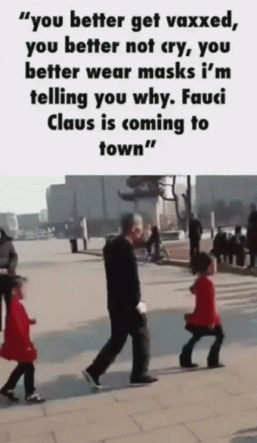 A Man Wearing A Mask Walks Down A Sidewalk Next To Two Children GIF