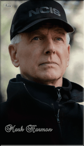 A Man Wearing A Ncis Hat And A Jacket GIF