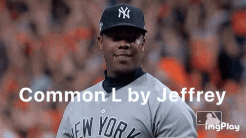 A Man Wearing A New York Yankees Baseball Uniform GIF