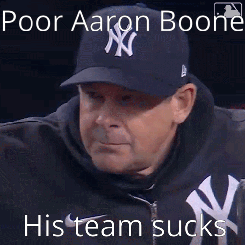 a man wearing a new york yankees hat with the caption poor aaron boone