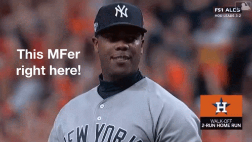 A Man Wearing A New York Yankees Jersey Is Standing In Front Of A Sign That Says This Mfer Right Here GIF