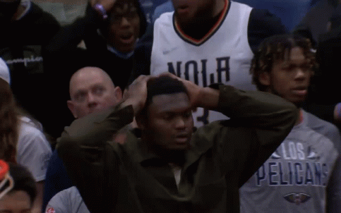A Man Wearing A No Jersey Holds His Hair GIF
