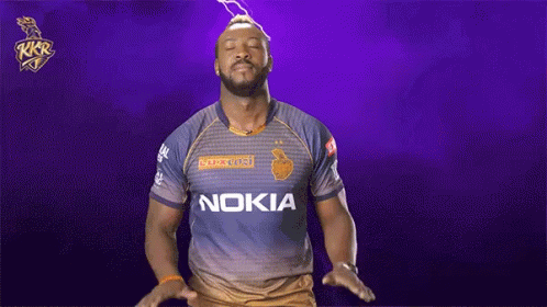 A Man Wearing A Nokia Shirt Is Standing In Front Of A Purple Background GIF