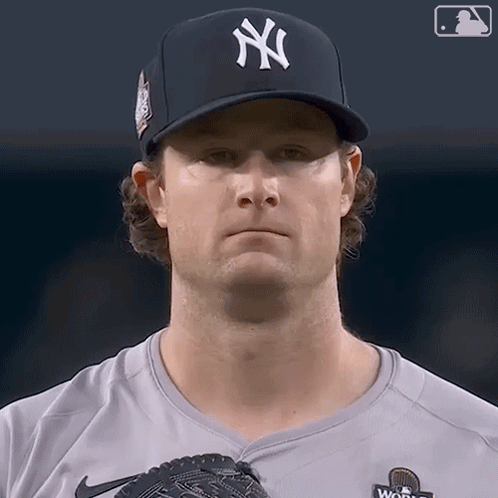 A Man Wearing A Ny Hat And A Nike Shirt GIF