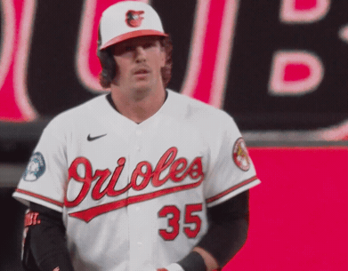A Man Wearing A Orioles Jersey With The Number 35 GIF